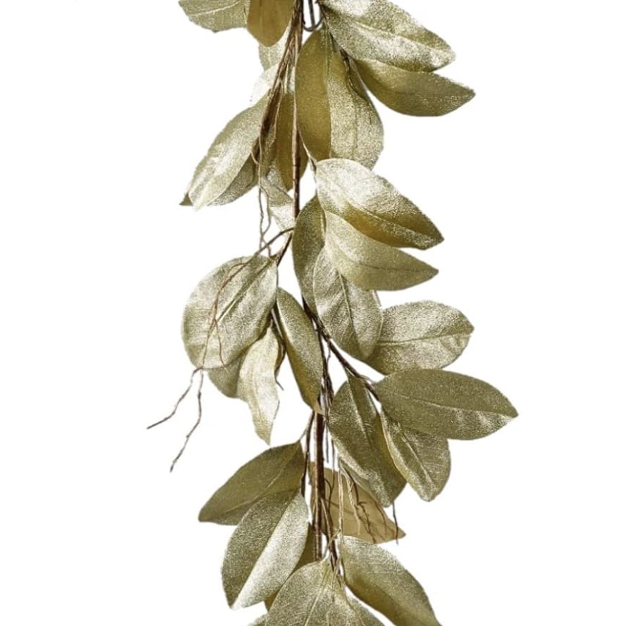 A decorative garland featuring clusters of shiny, metallic gold leaves attached to slender branches. The leaves are evenly distributed, creating a lush and elegant appearance. Perfect for DIY projects, the white background highlights the garland's golden shimmer beautifully.